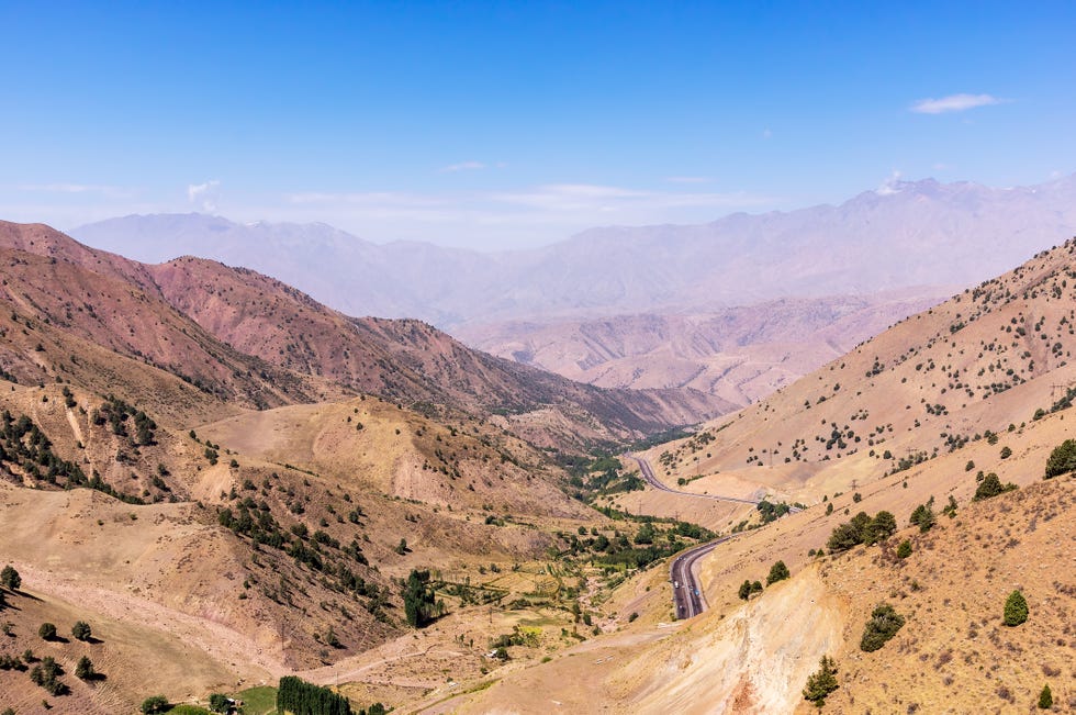Kamchik Passt viewpoint overlooking Qurama Mountains - Uzbekistan.