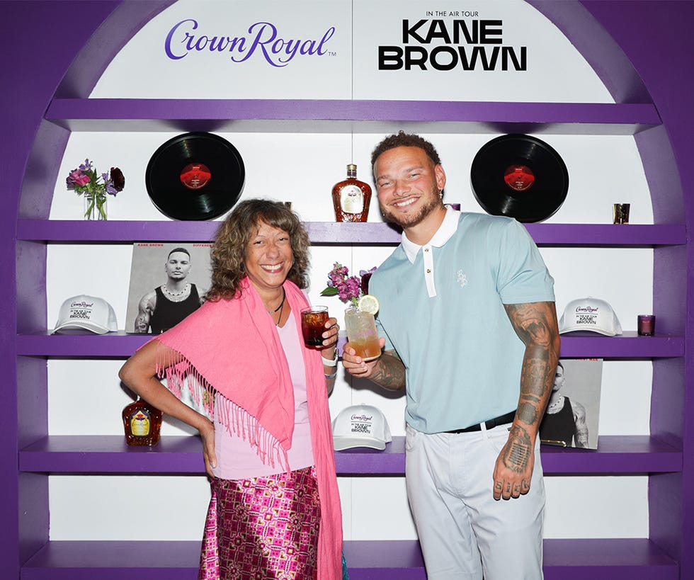 kane brown at crown royal event with the contest winner