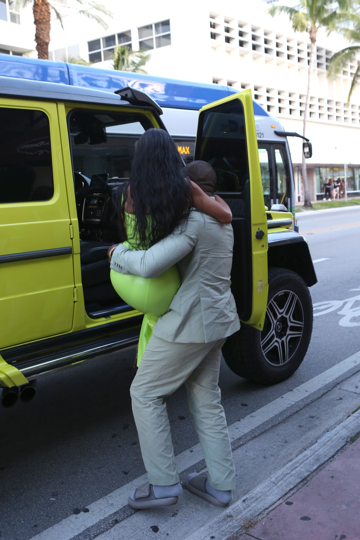 Kanye West Carries Kim Kardashian to the Car After Romantic Outing to 2  Chainz's Wedding