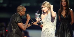 Kanye West jumps onstage after Taylor Swift won the Best Female Video award during the 2009 MTV Video Music Awards on September 13, 2009, in New York City.