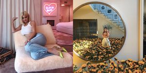 kylie jenner in her home, lying on a sofa against a pink neon light and then posing in a round mirror with sunflowers at her feet