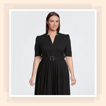 a woman in a stylish black dress