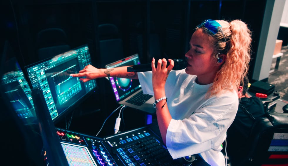 a woman in a recording studio