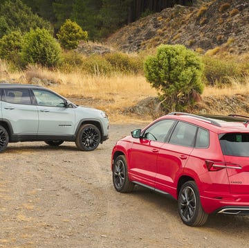 skoda karoq tsi vs jeep cherokee ehybrid