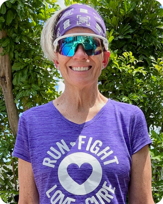 a runner wearing a bandana and glasses