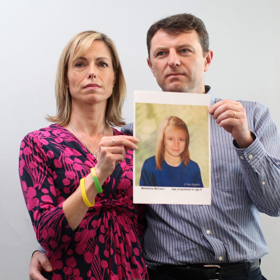 Kate and Gerry McCann hold up a picture of what Madeleine McCann would look like, 2012