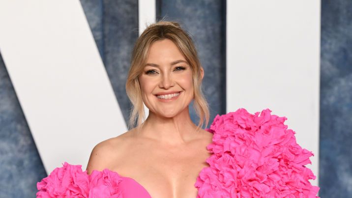 Kate Hudson shows off her toned physique as she poses topless in a