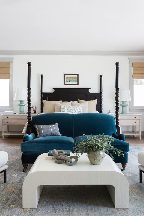 bedroom makeover ideas, four poster bed with blue couch