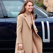 kate middleton carries a demellier bag to illustrate a post about the demellier bag black friday sale 2022