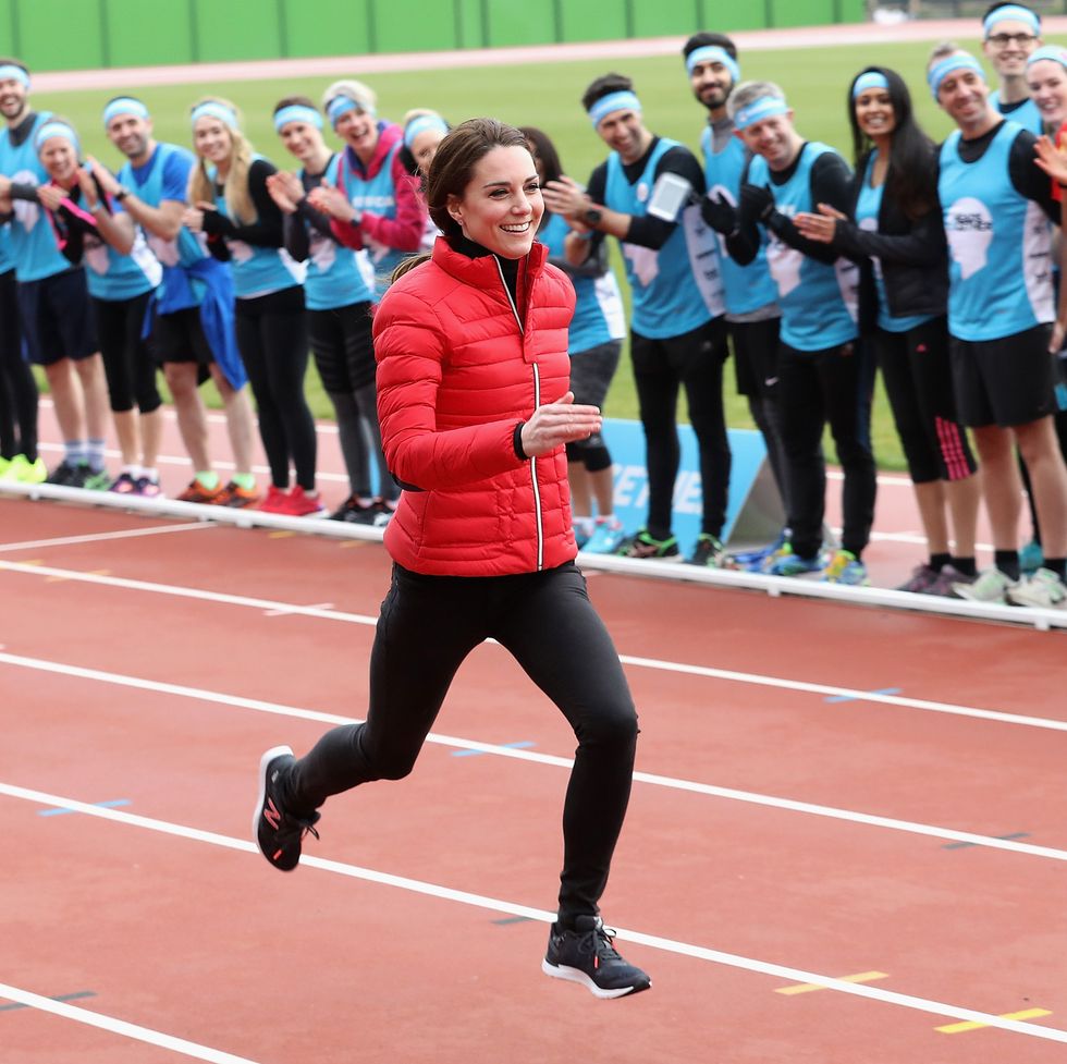 kate middleton running on an athletics track