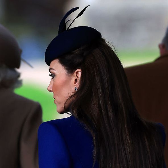 kate middleton in profile wearing a hat