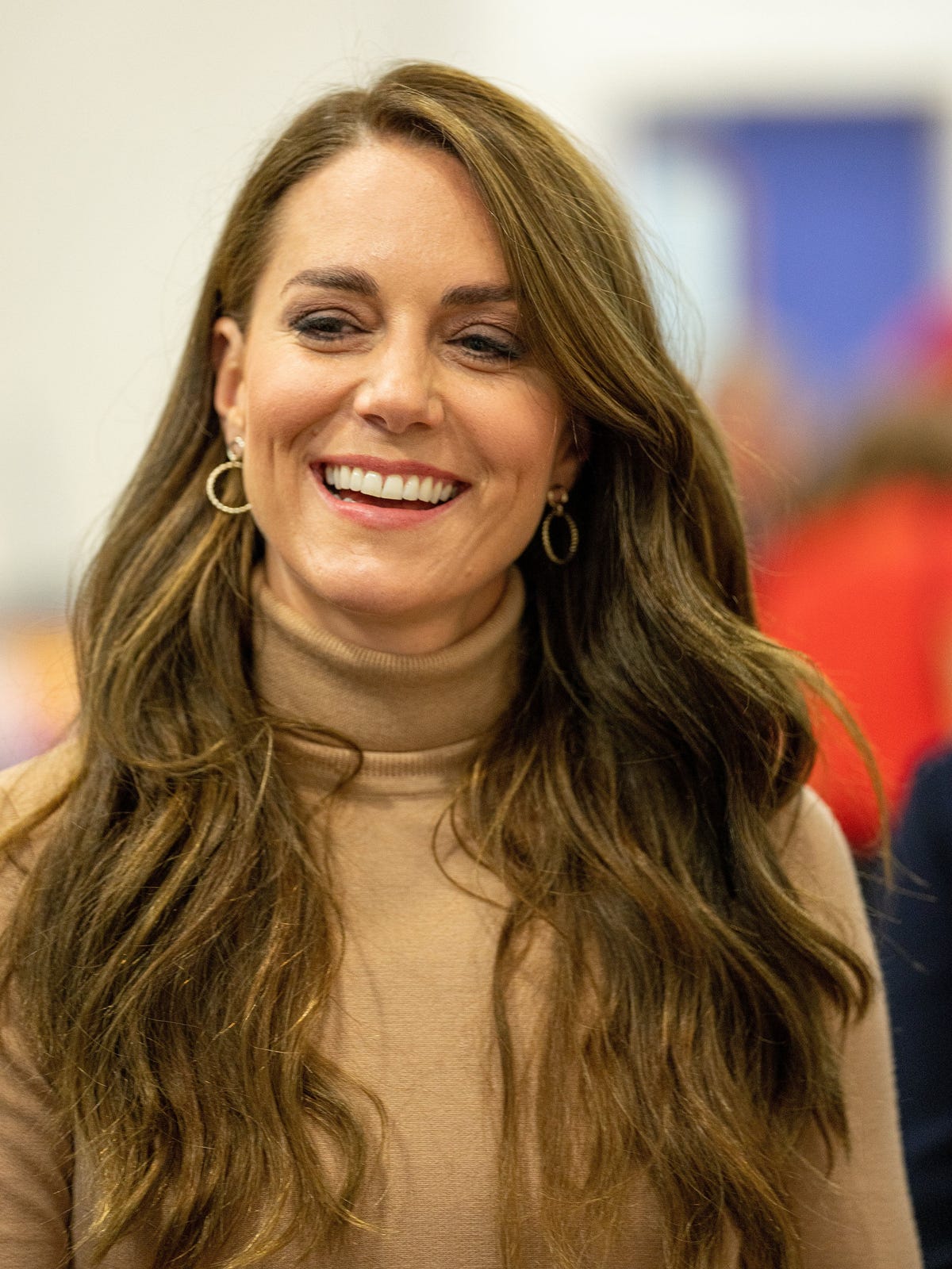 Long Light Brown Wind Swept Middle Part Hair