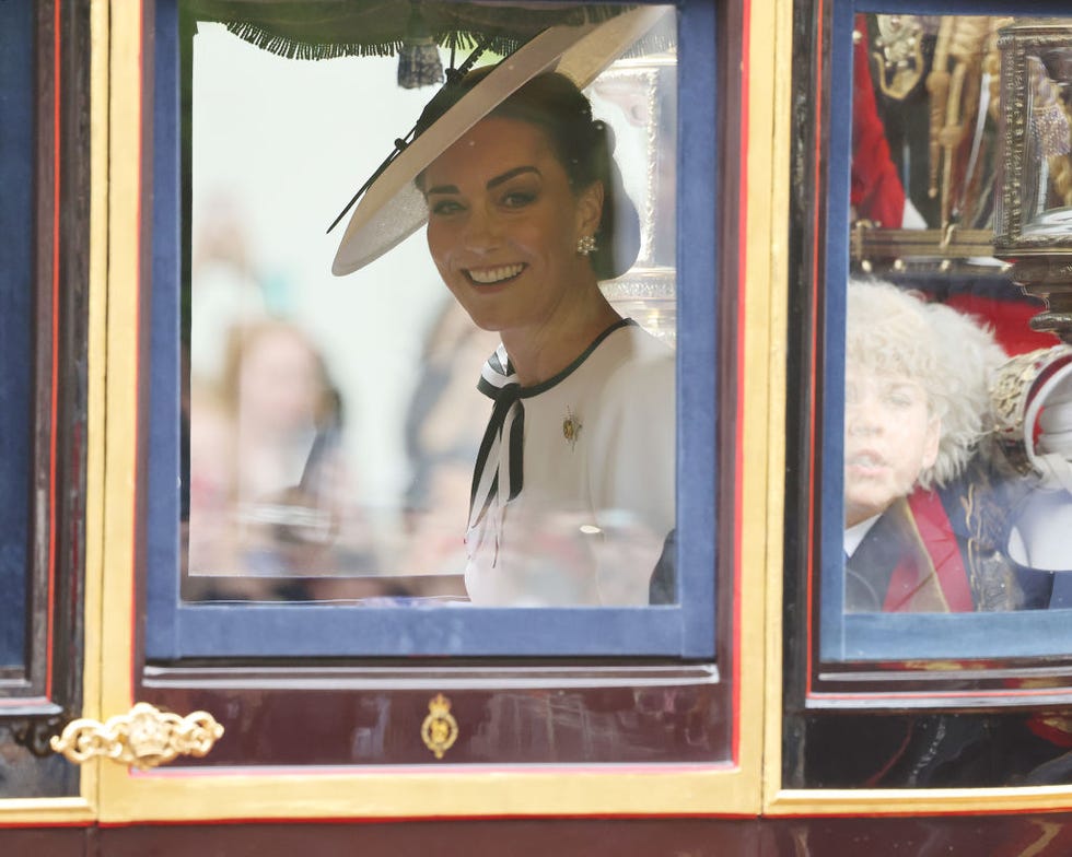 london, england june 15 catherine, princess of wales and prince louis of wales during trooping the colour on june 15, 2024 in london, england trooping the colour is a ceremonial parade celebrating the official birthday of the british monarch the event features over 1,400 soldiers and officers, accompanied by 200 horses more than 400 musicians from ten different bands and corps of drums march and perform in perfect harmony photo by neil mockfordgc images