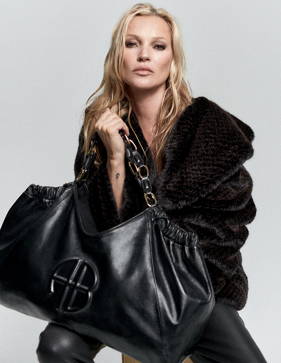 Kate Moss does sexy indie sleaze in leather thigh highs and suit