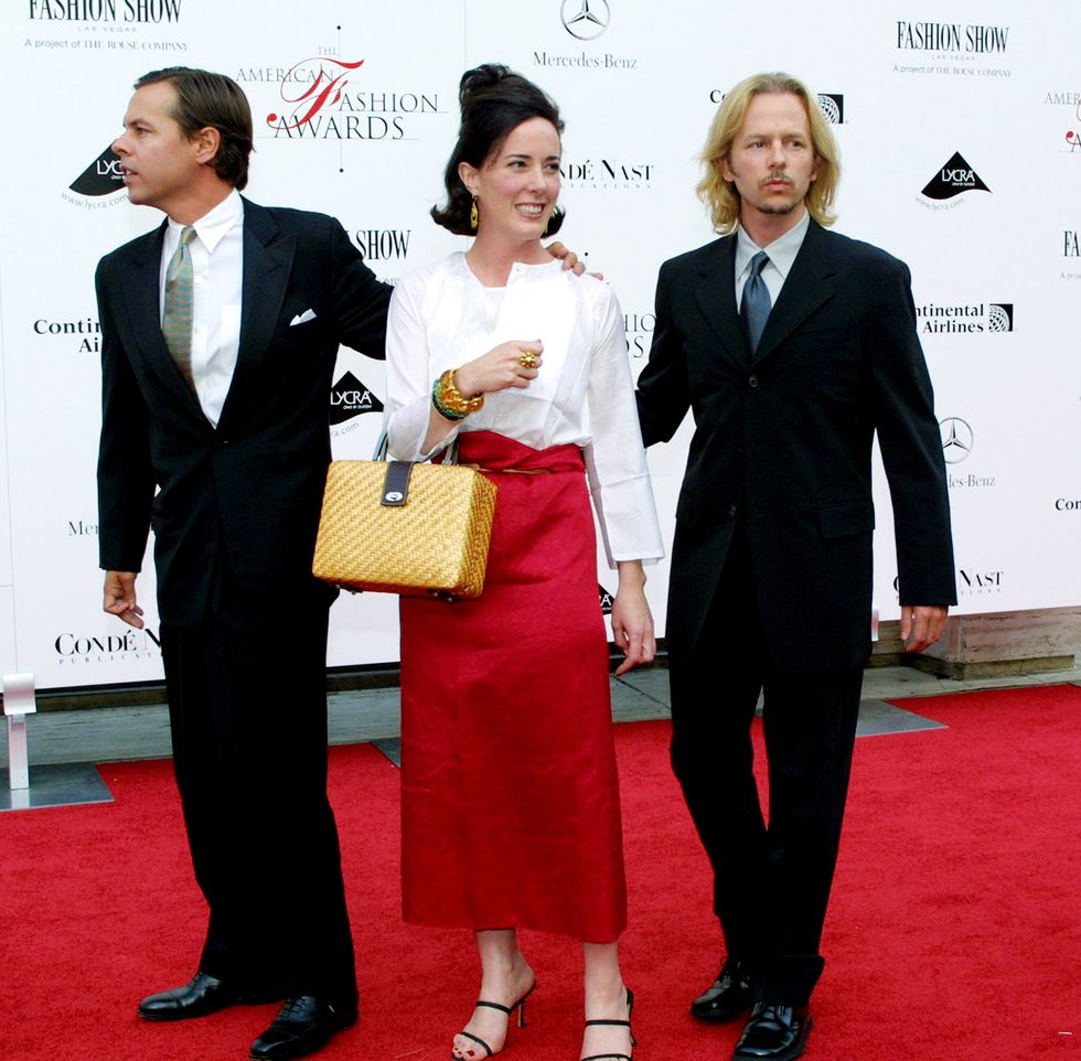 Kate Spade with her huband, left, and her brother David, right, attend the Council of Fashion Designers of America''s 20th Annual American Fashion Awards June 14, 2001 in New York City.