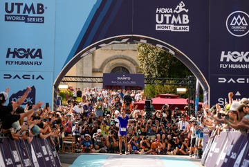 katie schide at the finish line of the utmb 2024