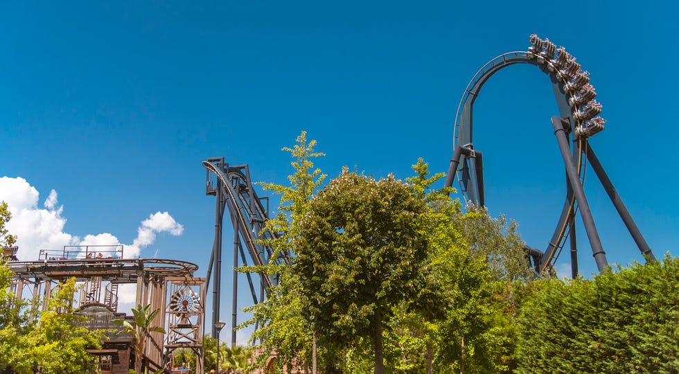 Amusement ride, Roller coaster, Amusement park, Landmark, Park, Sky, Recreation, Nonbuilding structure, Fun, Plant, 