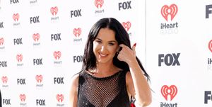 katy perry wears a see through fishnet dress to the 2024 iheartradio music awards