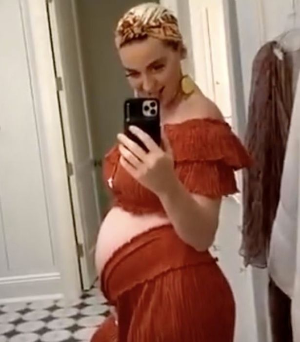 katy perry shares photo of her baby bump as she opens up about isolating with orlando bloom
