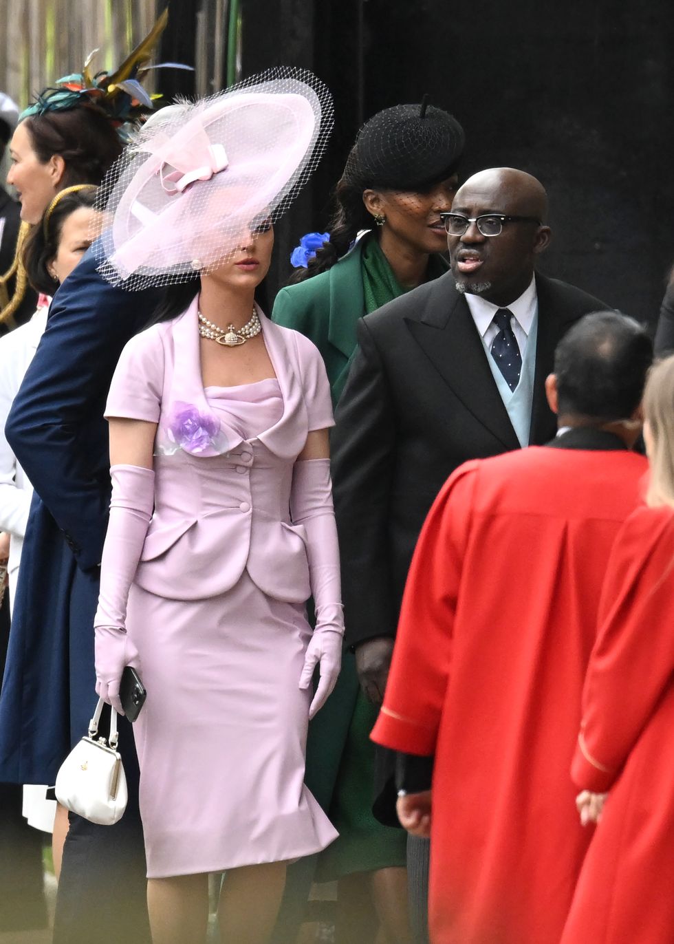 Katy Perry arrives at the coronation in pink suit