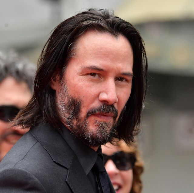 Keanu Reeves Places His Hand Prints In Cement At TCL Chinese Theatre IMAX Forecourt