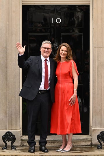 london, england july 5 labour leader and incoming prime minister sir keir starmer and wife victoria greet supporters as they enter 10 downing street following labours landslide election victory on july 5, 2024 in london, england the labour party won a landslide victory in the 2024 general election, ending 14 years of conservative government photo by leon nealgetty images