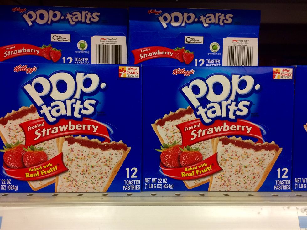 boxes of strawberry flavor pop tarts on a shelf