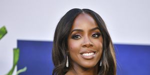kelly rowland attends the world premiere of universal pictures nope wearing her dark hair down long and wavy