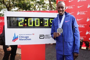 a man holding a trophy