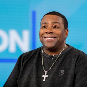 kenan thopmson looking up and smiling