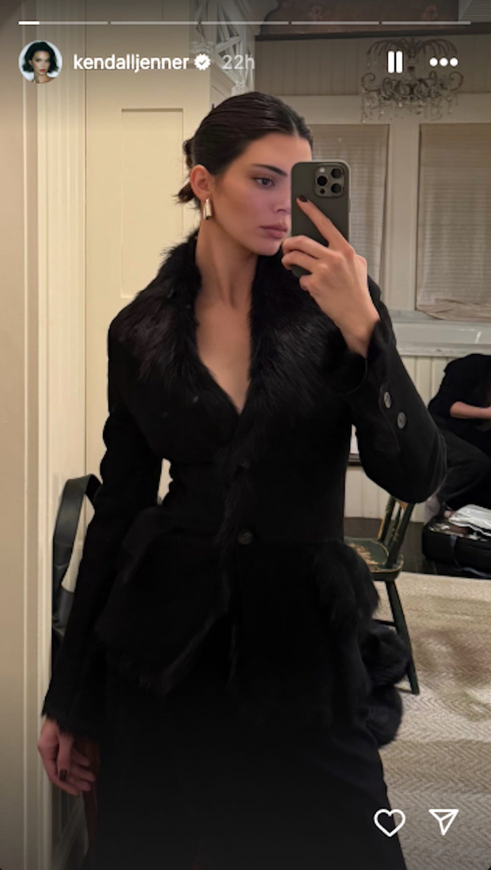 fashion selfie showcasing a black furtrimmed blazer