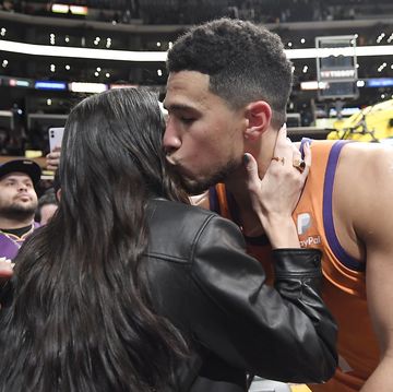 los angeles, ca   october 22 kendall jenner and devin booker 1 of the phoenix suns kiss and hug after the suns defeated the los angeles lakers, 115 110, at staples center on october 22, 2021 in los angeles, california note to user user expressly acknowledges and agrees that, by downloading andor using this photograph, user is consenting to the terms and conditions of the getty images license agreement photo by kevork djanseziangetty images