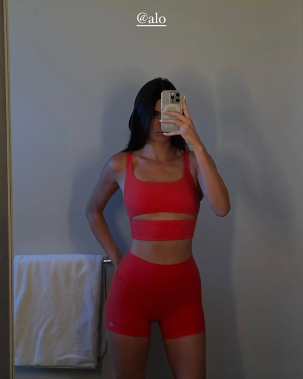 Kendall Jenner in a chic red athleisure outfit