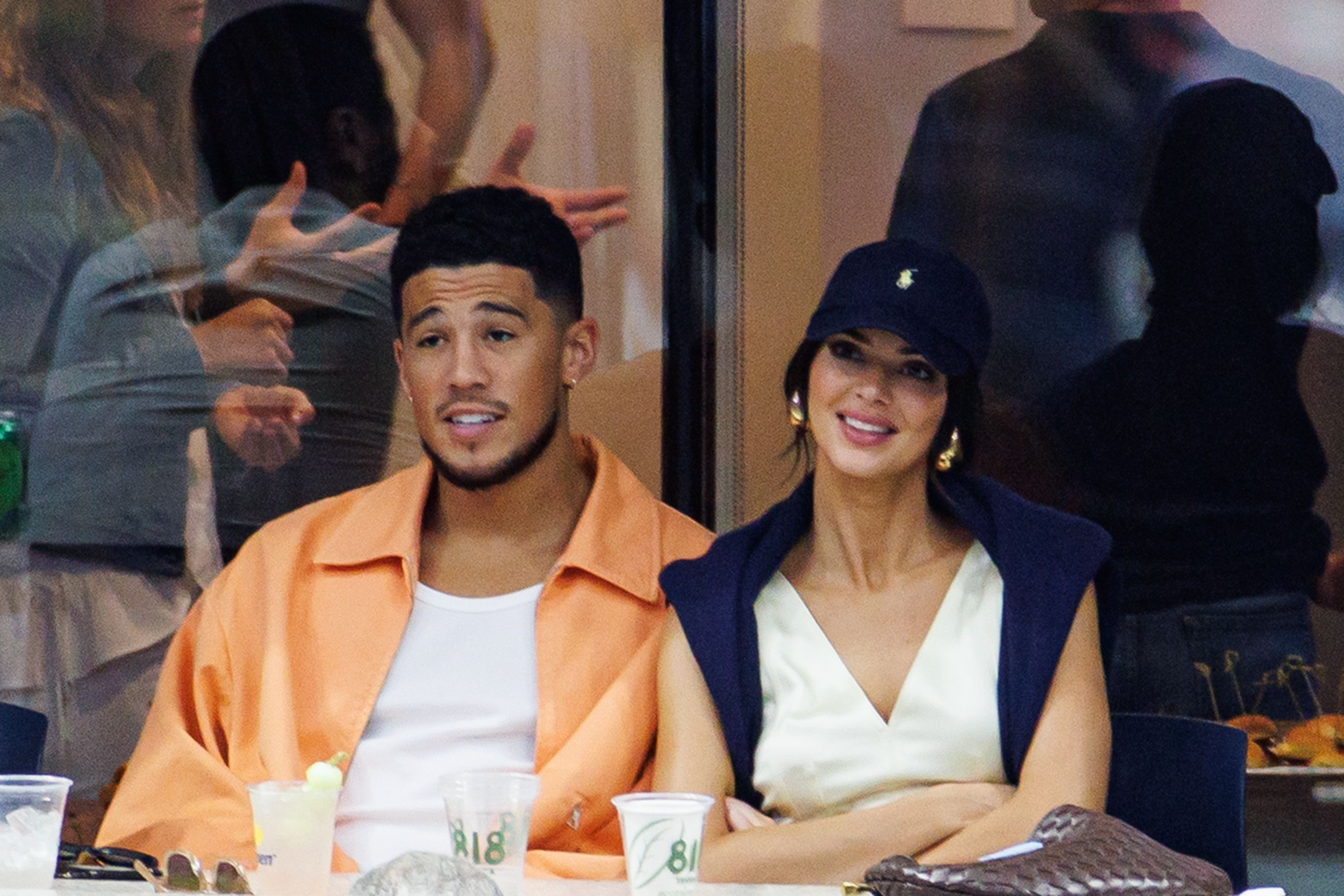 Kendall Jenner & boyfriend Devin Booker are joined by her younger