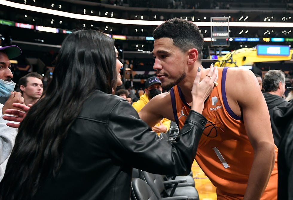 kendall jenner and devin booker lean in for a huge after the phoenix suns v los angeles lakers game that the sun won