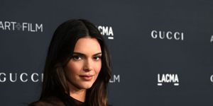 kendall jenner on the red carpet with hair down and sheer dress