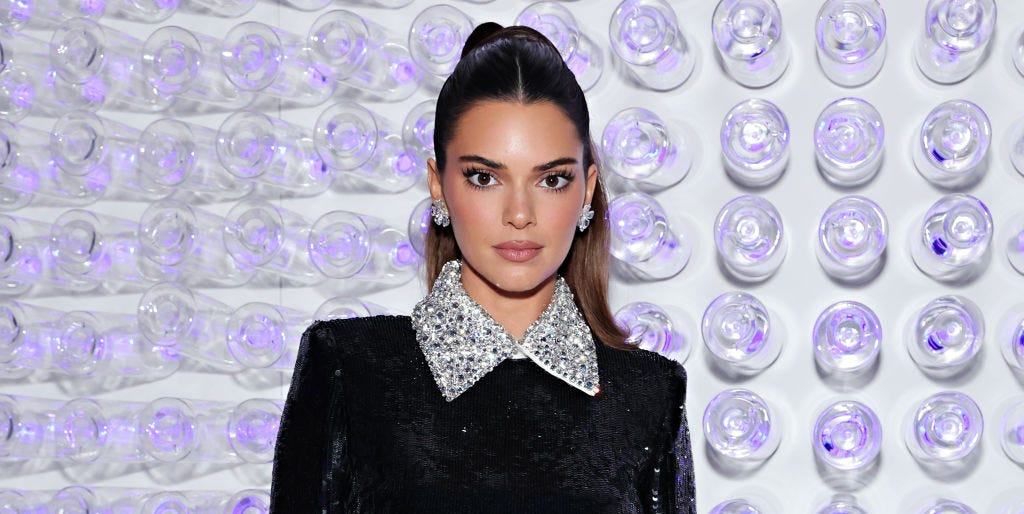 Kendall Jennerâs Little Black Dress Includes a Mesh Bust and Glossy