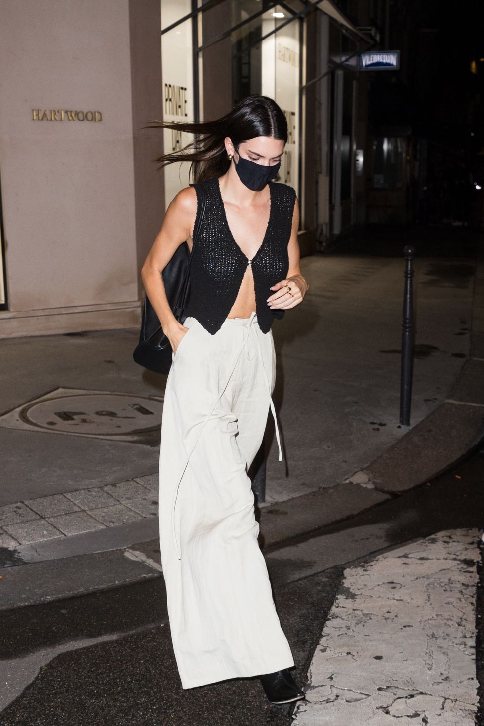 Kendall Jenner Wears Off-White Tee and Corset in Paris