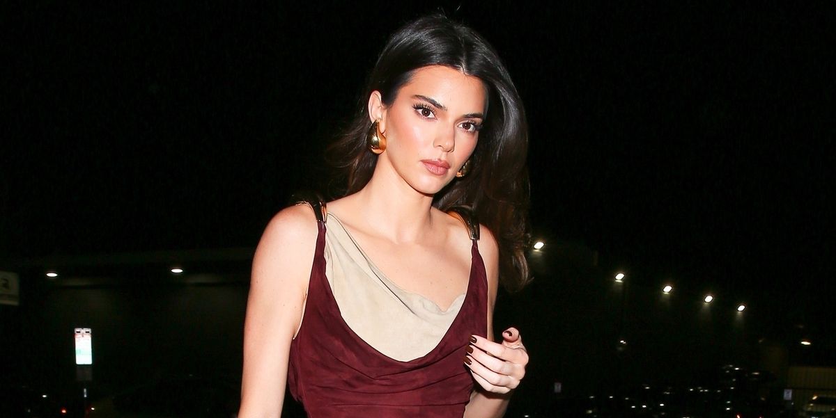 Kendall Jenner Wore a Burgundy Bodycon Minidress and Matching Tights