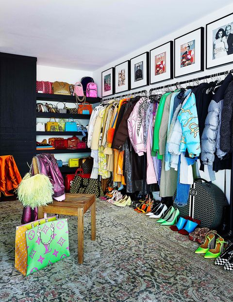 kendall jenner's fitting room filled with clothes, shoes, and accessories