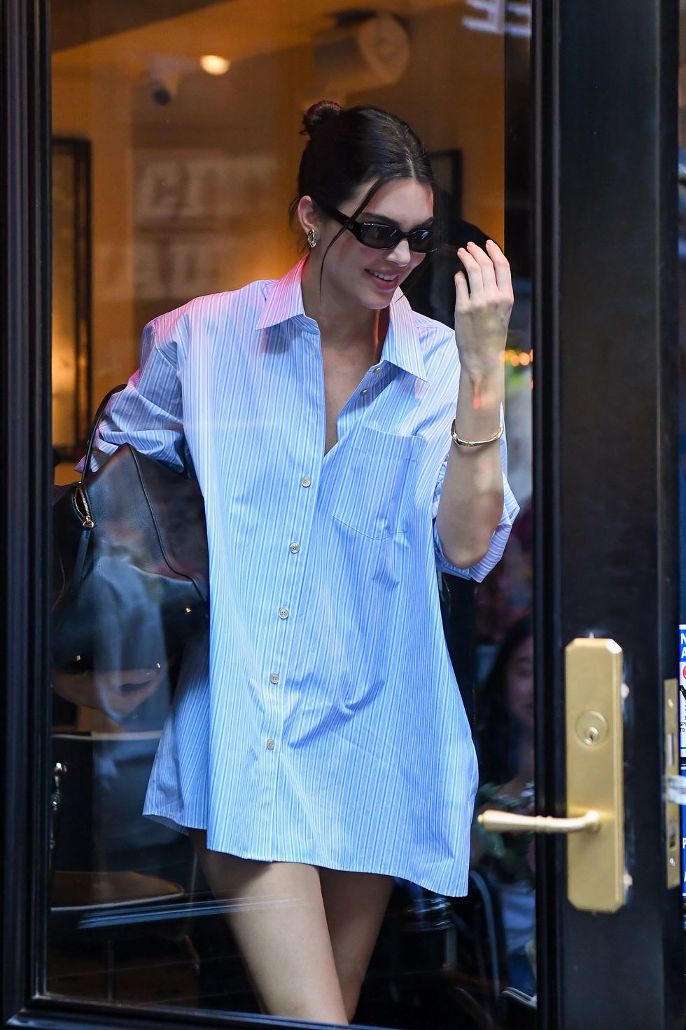 Kendall Jenner: Blue Sweatshirt, High-Waist Jeans