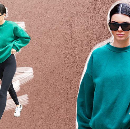 Kendall Jenner dons a cropped white hoodie and black leggings