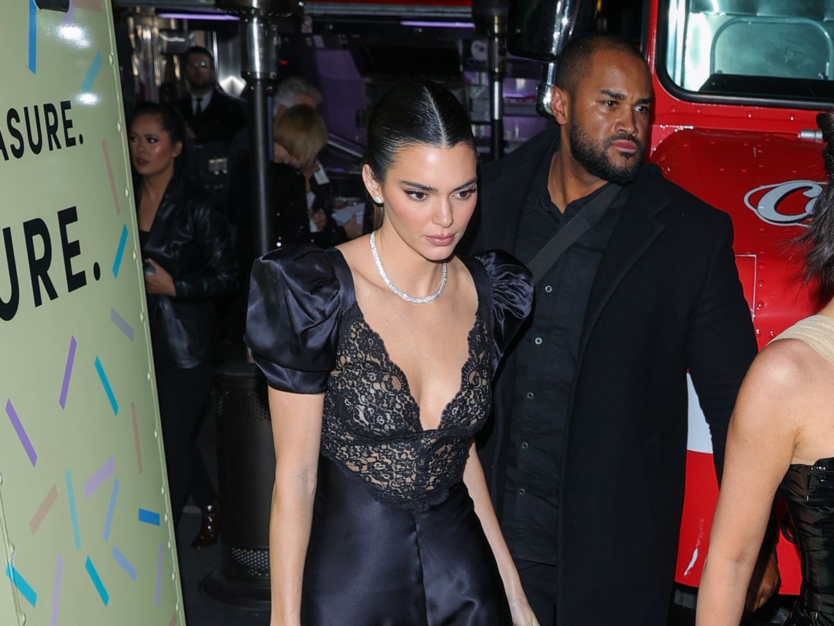 Kendall Jenner Wore the Tiniest Slip Dress with Tights and Open