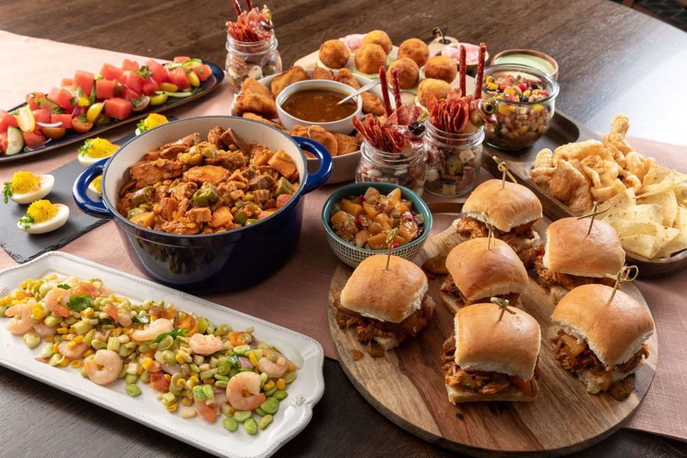 platter of sliders and other foods