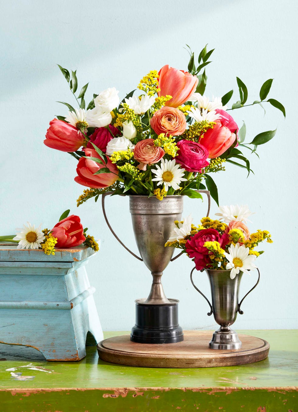 kentucky derby party floral arrangements in vintage trophies