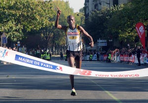 Kenyan runner Sammy Kitwara jubilates as