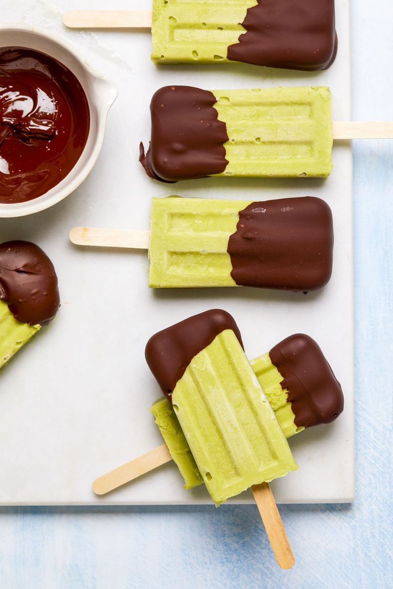 keto green avocado popsicles covered in chocolate