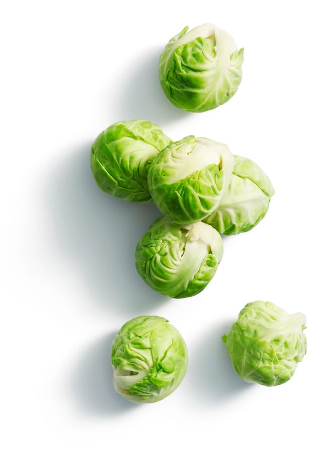 Brussels sprouts on a white surface
