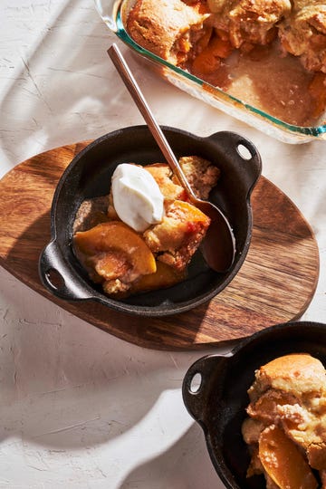 gluten free peach cobbler in a small cast iron pot