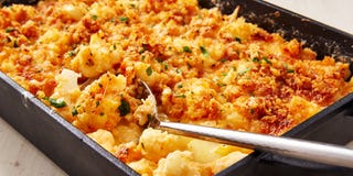 keto mac and cheese in a black cast iron pan with a silver spoon keto mac and cheese in a black cast iron pan with a silver spoon